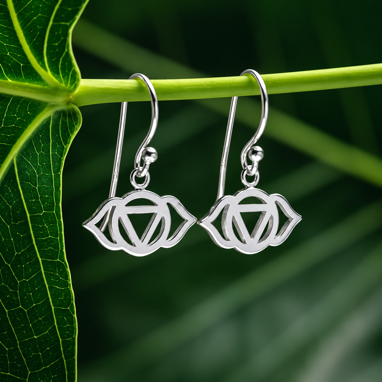 Ajna in Silver: Lotus Earrings Among Leaves
